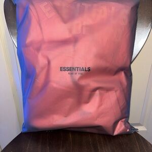 Fear of God Essentials Pink Hoodie